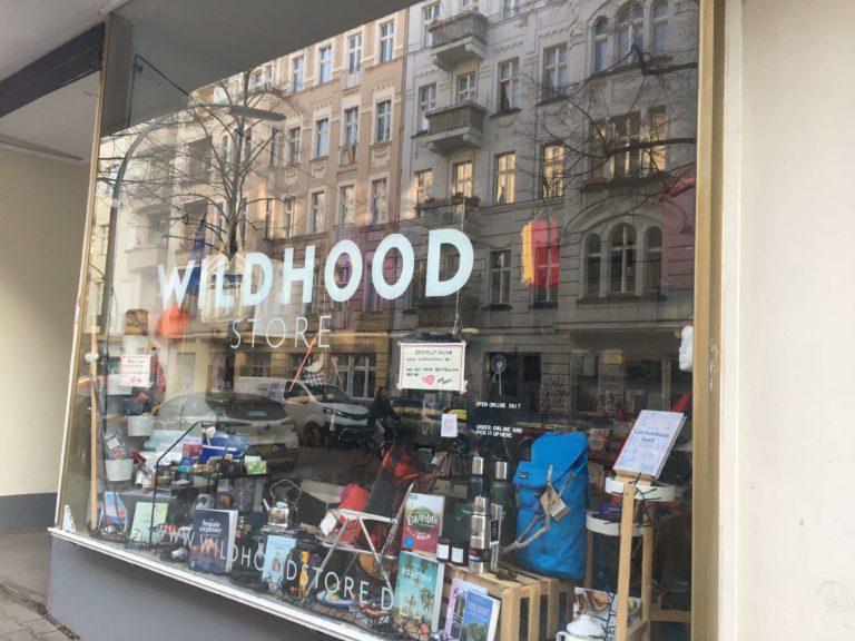 window of the wildhood store in Neukölln, with many goods shown