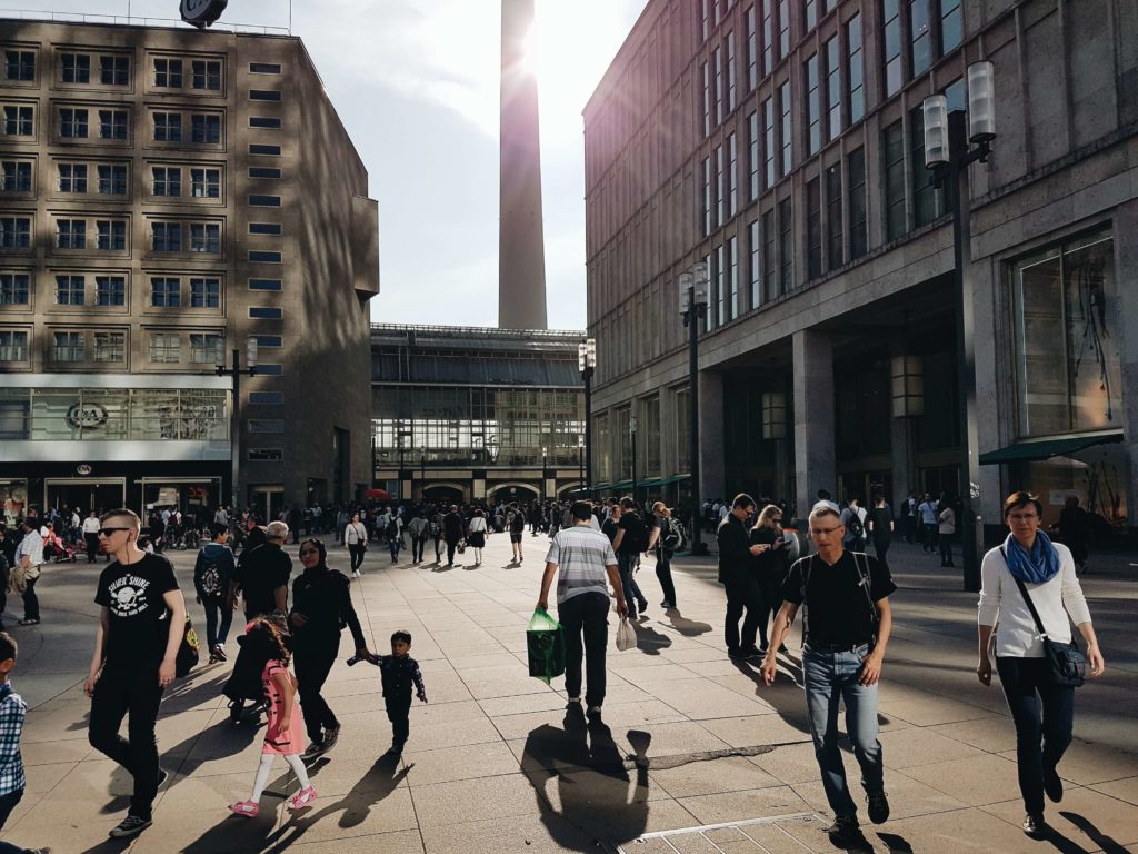 Alexanderplatz and many people walking on the street