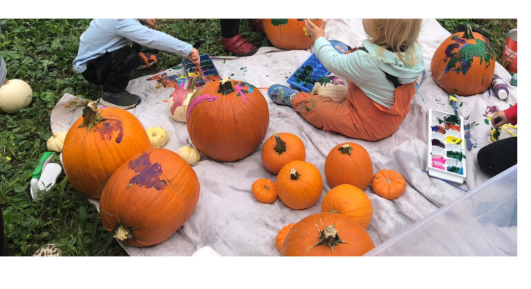 Kids crafting with pumpkin