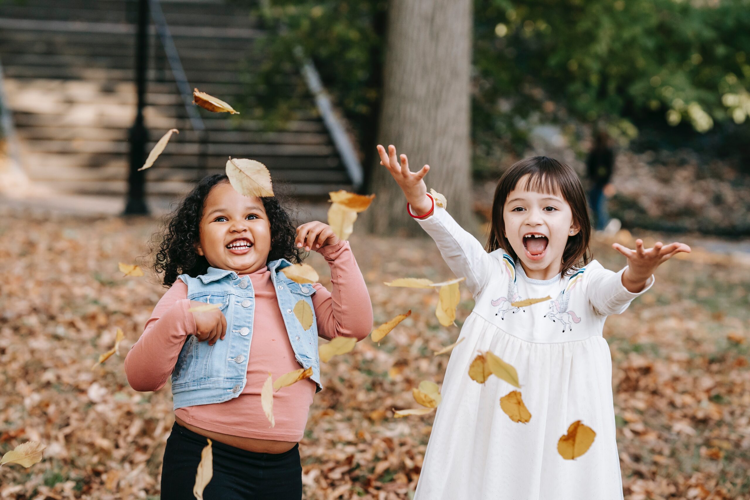 children playing in the fall